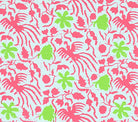 Patterned fabric with pink and green floral designs on a white background