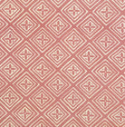 Patterned fabric with geometric design on a pink background