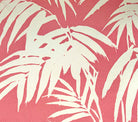White palm leaf pattern on a pink background
