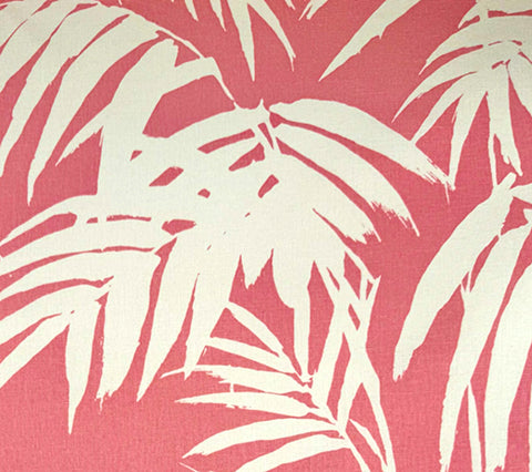 White palm leaf pattern on a pink background
