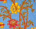 A close-up of a patterned textile or wallpaper featuring stylized flowers and birds on a light blue dotted background. The design includes yellow, orange, pink, and blue floral motifs with red-orange stems and green leaves.