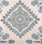 Decorative pattern with blue and brown colors on a beige background