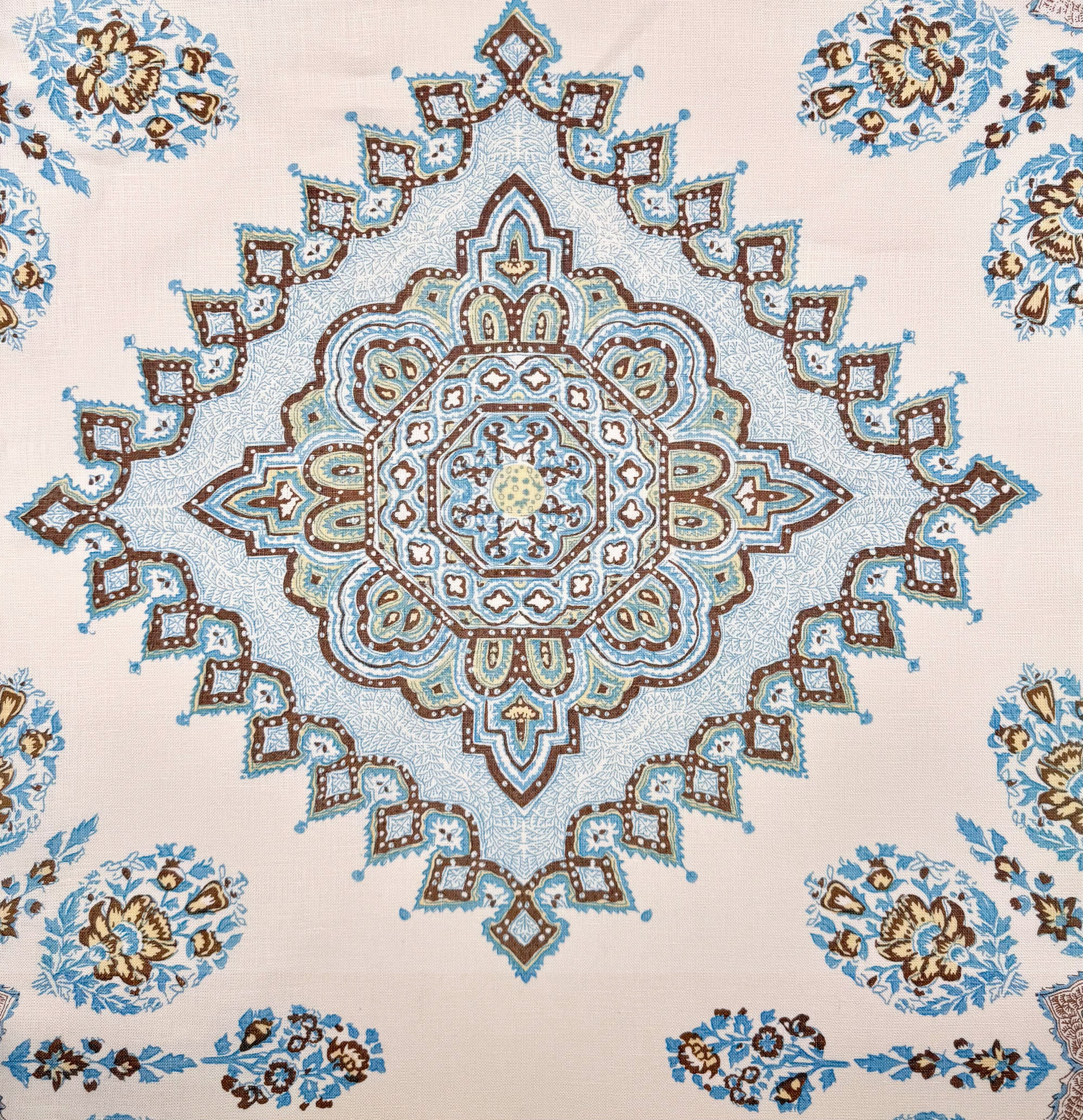 Decorative pattern with blue and brown colors on a beige background
